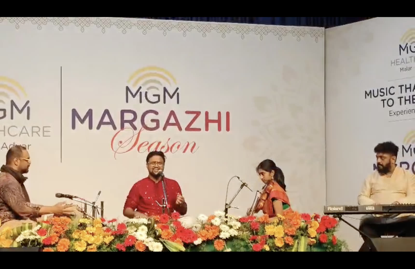 Aiswarya Vaikunth performing Carnatic violin at a classical concert in India